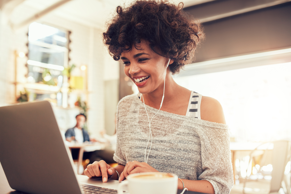 Happy woman with good website ux user experience Happy woman with good website ux user experience