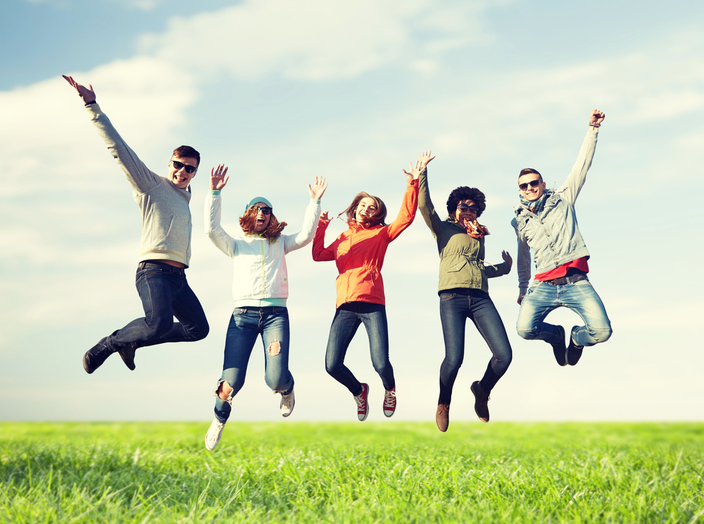people jumping with happiness