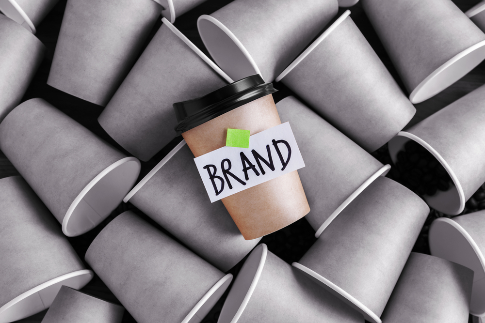 Coffee cup showing the word brand