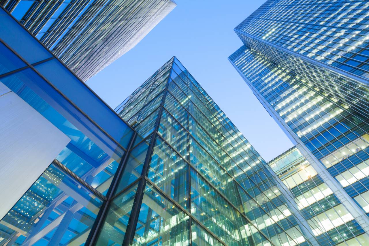 Looking upwards at skyscrapers