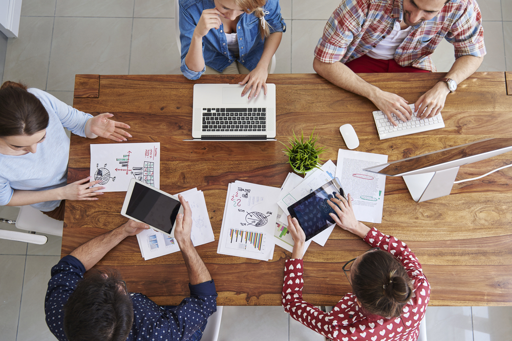 Multiple devices People reading digital industry news
