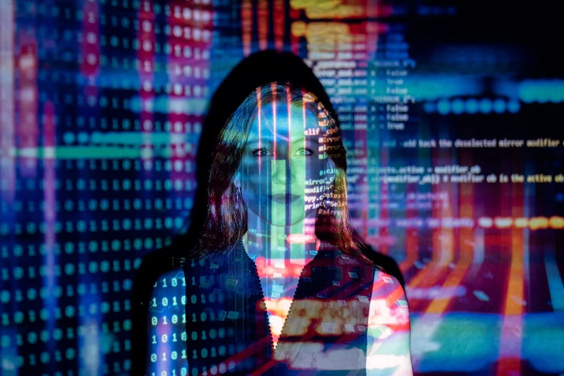 A woman with data projected on her face