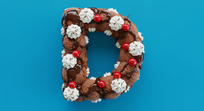 A chocolate cream sundae in the shape of a capital letter D